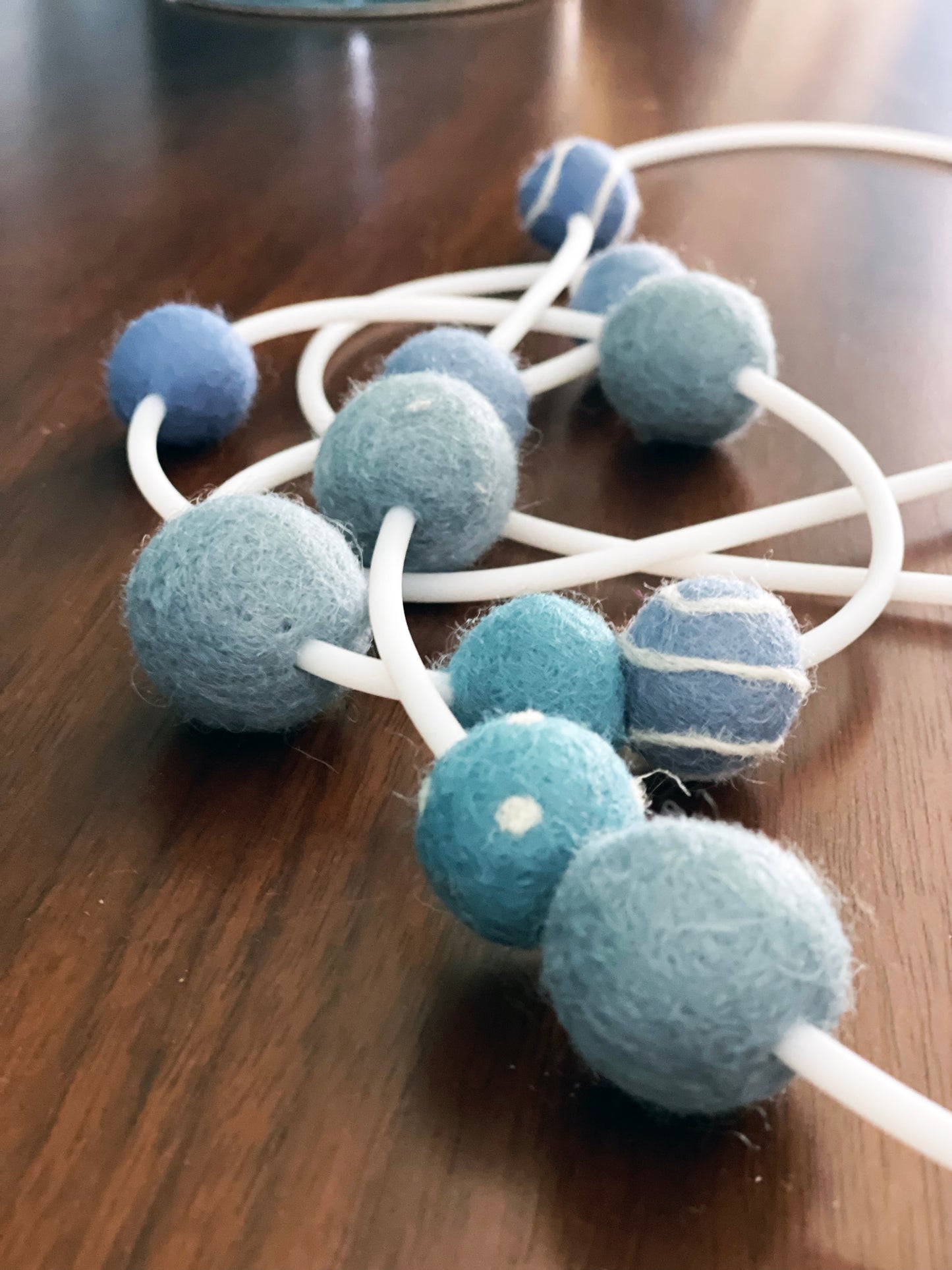 Modern Long Single/Double Strand White Rubber Necklace With 11 Blue-Color Wool Felt Balls