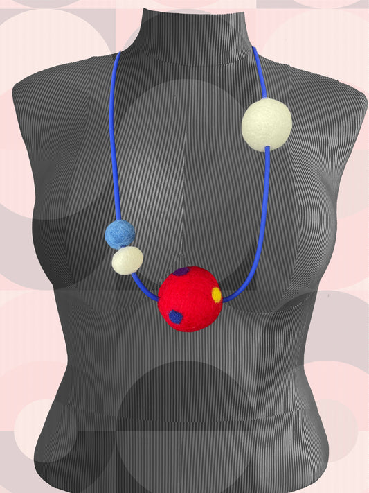 Modern Long Single Strand Blue Rubber Necklace With 4 Red/White/Blue Wool Felt Balls